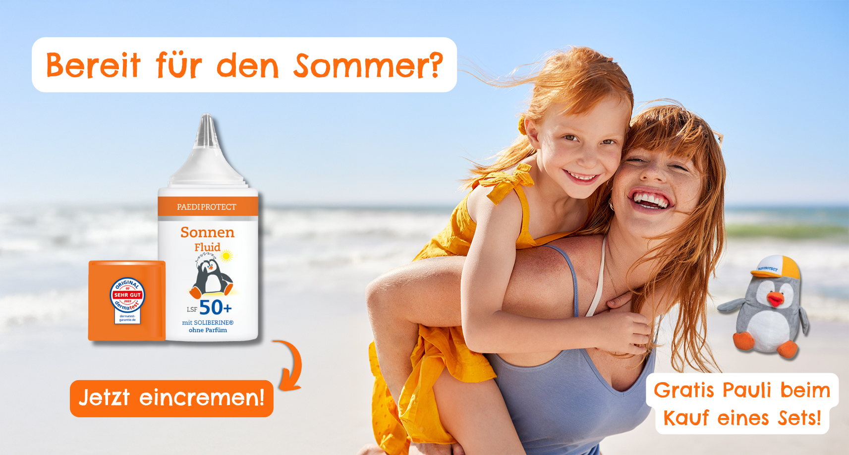 a woman carrying a girl on her back on a beach